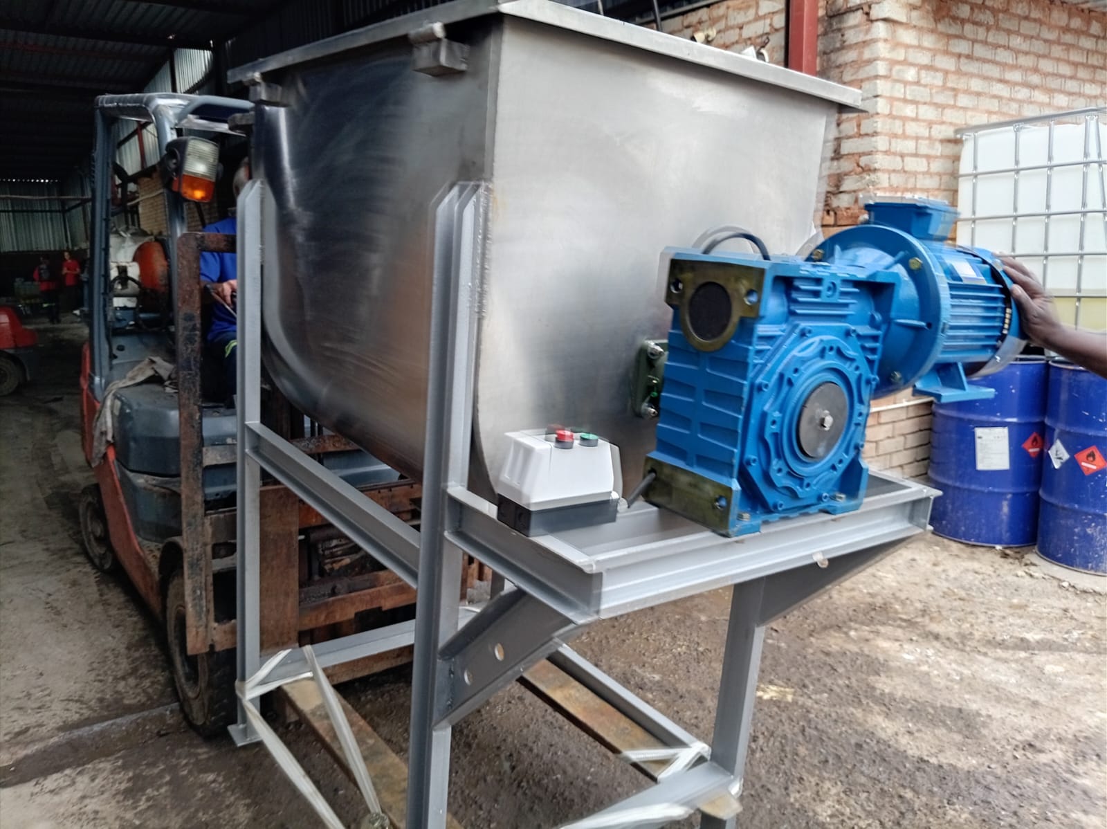 SME Machinery ribbon blender mixer loaded onto a forklift for delivery