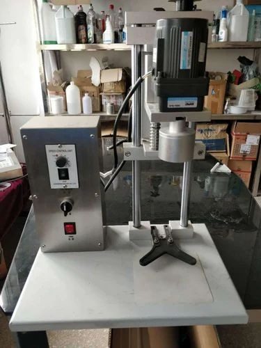 SME Machinery bottle capping machine on workbench, serving the Bronkhorstspruit/Cullinan area